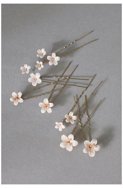 hermes hair pin|hermes small flower pins.